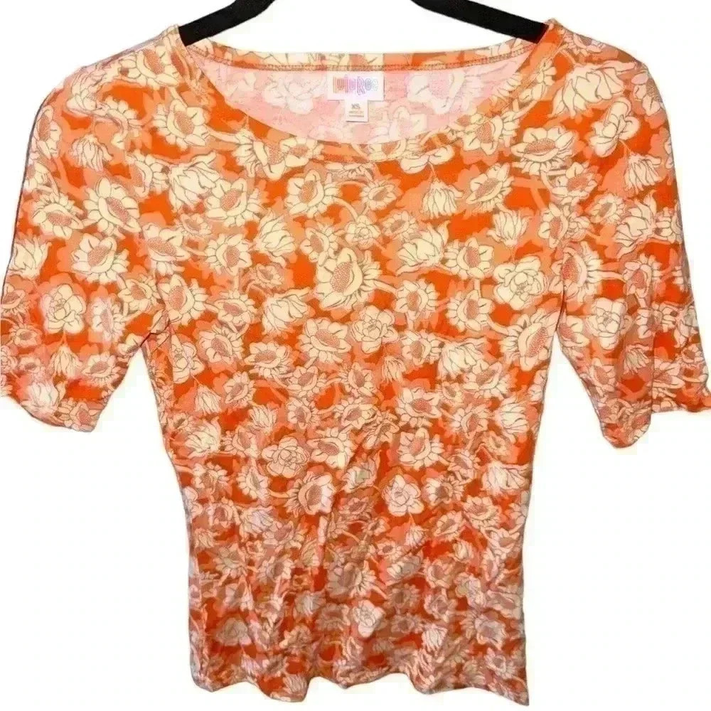 Lularoe XS‎ orange and ivory floral Gigi fitted t-shirt. NWT.